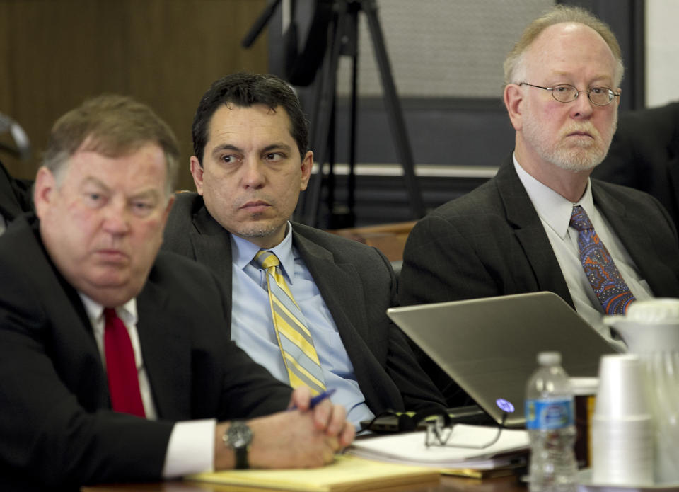 Attorneys for the plaintiff groups, from left; Rick Gray, David Hinojosa and David Thompson listen to the state's attorney during opening remarks in the Texas school finance trial, Tuesday, Jan. 21, 2014, in Austin, Texas. The trial re-opened after a year hiatus so that the judge could collect evidence in light of last year's legislative changes. Opening statements from the school district plaintiff groups and the state kicked off proceedings that could last three to four weeks in Judge John K. Dietz' courtroom. (AP Photo/Austin American-Statesman, Ralph Barrera) AUSTIN CHRONICLE OUT, COMMUNITY IMPACT OUT, MAGS OUT; NO SALES; INTERNET AND TV MUST CREDIT PHOTOGRAPHER AND STATESMAN.COM