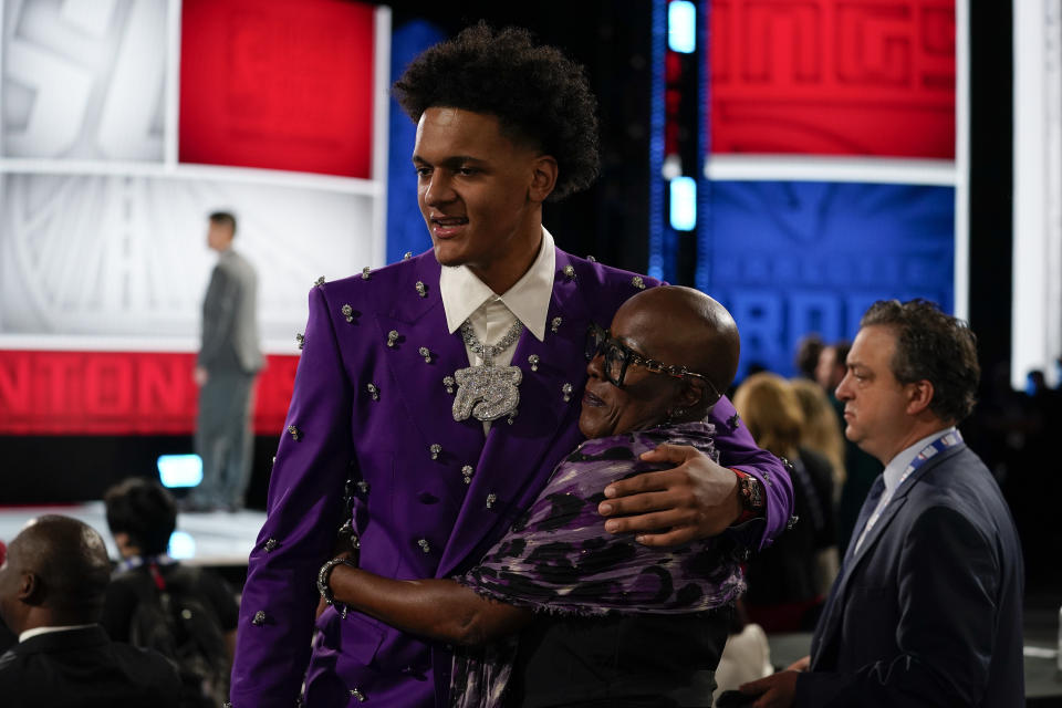 Paolo Banchero talks with friends and family before the start of the NBA basketball draft, Thursday, June 23, 2022, in New York. (AP Photo/John Minchillo)