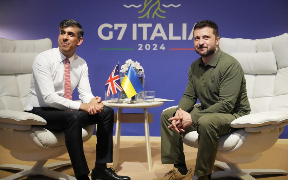 Rishi Sunak attends a meeting with Volodymyr Zelensky at the G7 leaders' summit at the Borgo Egnazia resort in Italy