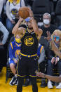 Golden State Warriors guard Stephen Curry (30) attempts a 3-point basket, which he did not make, during the first half of the team's NBA basketball game against the Portland Trail Blazers in San Francisco, Wednesday, Dec. 8, 2021. (AP Photo/Jeff Chiu)