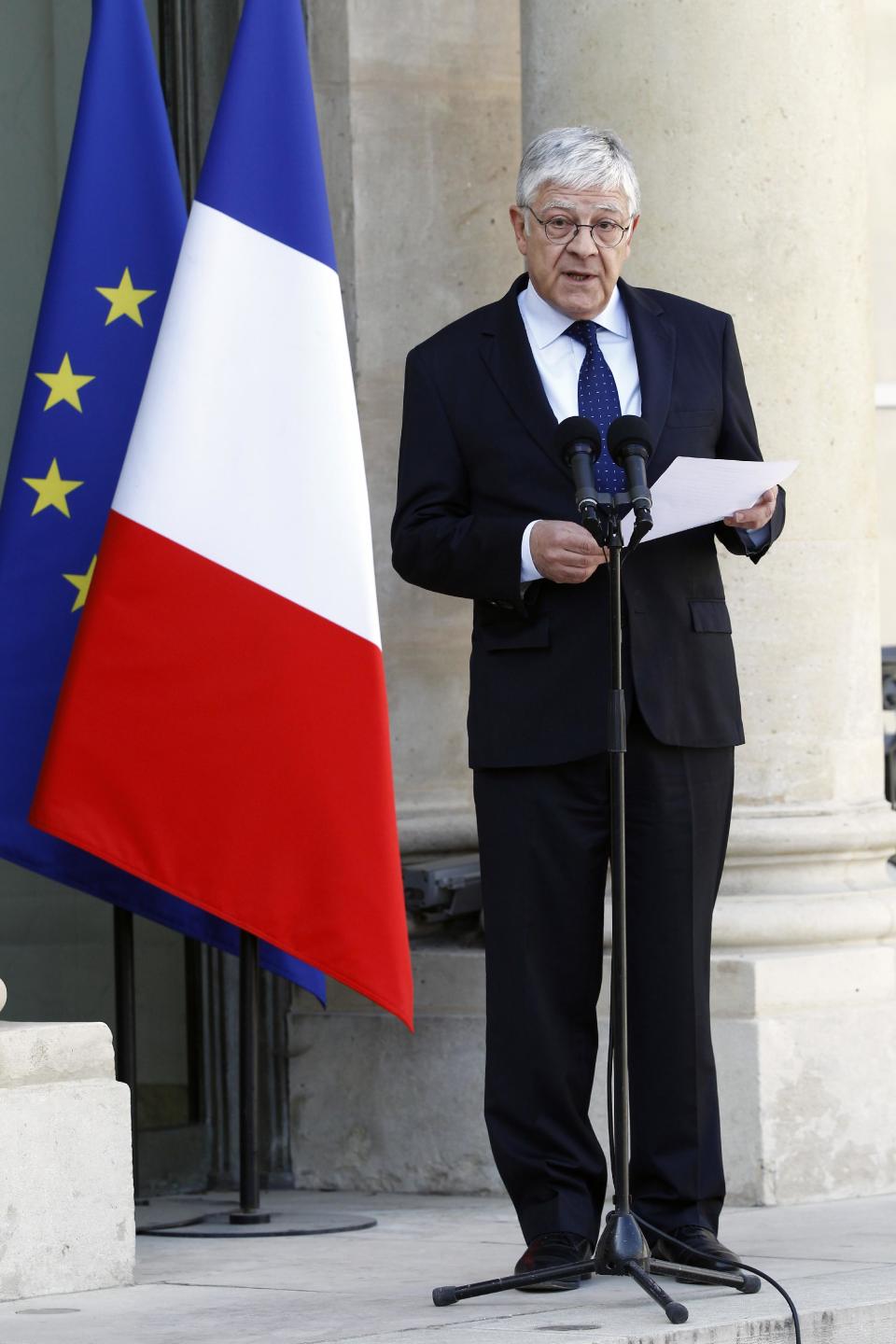 Elysee secretary general Pierre-Rene Lemas annouces the compositon of the new government during a statement at the Elysee Palace in Paris, Wednesday April 2, 2014. French President Francois Hollande has approved a new Cabinet that includes his ex-companion Segolene Royal as minister of environment and energy. French President Francois Hollande approved a new Cabinet Wednesday that includes his ex-companion Segolene Royal as minister of environment and energy.The new government was named after discussions between new Prime Minister Manuel Valls and Hollande, and follow a crushing defeat for their Socialist Party in municipal voting last week. (AP Photo/Remy de la Mauviniere)