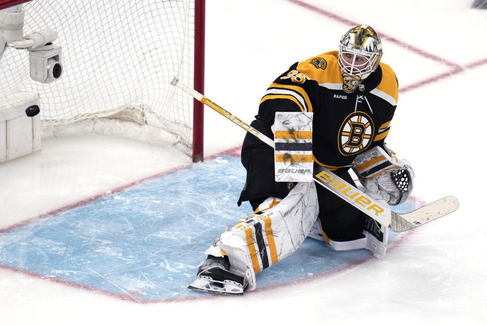 Boston Bruins goaltender Linus Ullmark looks back at the puck on a goal by Florida Panthers defenseman Brandon Montour during the third period of Game 2 in the first round of the NHL hockey playoffs, Wednesday, April 19, 2023, in Boston. (AP Photo/Charles Krupa)