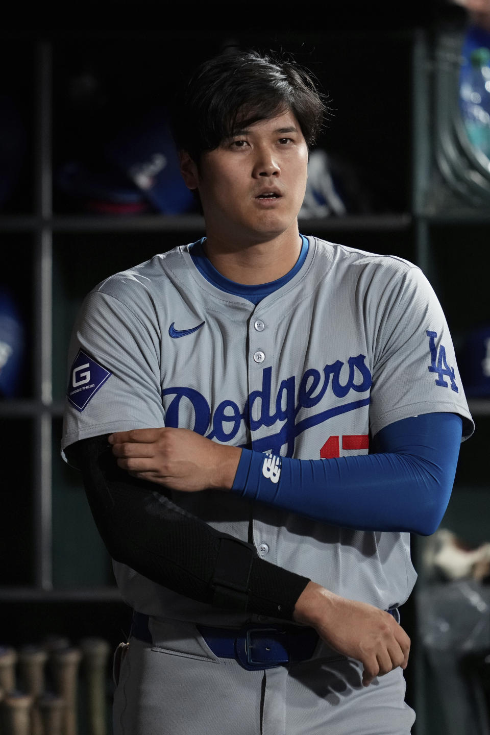 Los Angeles Dodgers' Shohei Ohtani walks through the dugout during the eighth inning of the team's baseball game against the San Francisco Giants, Friday, June 28, 2024, in San Francisco. (AP Photo/Godofredo A. Vásquez)