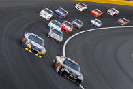 CHARLOTTE, NC - MAY 19: Dale Earnhardt Jr., driver of the #88 Dale Jr. Foundation/National Guard/Diet Mountain Dew Chevrolet, leads the field during the NASCAR Sprint Showdown at Charlotte Motor Speedway on May 19, 2012 in Charlotte, North Carolina. (Photo by Chris Graythen/Getty Images)