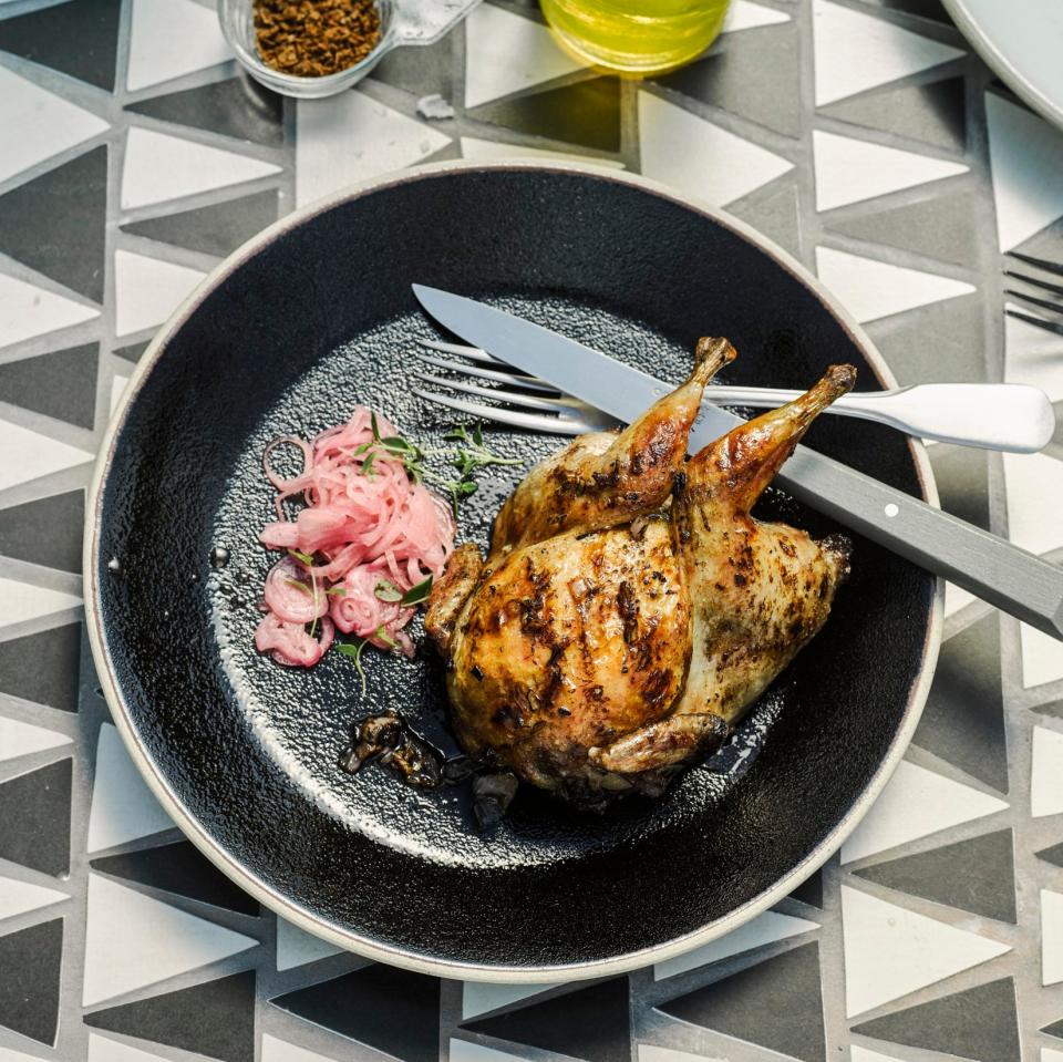 Griddled marinated quail with pickled shallots - Credit: Haarala Hamilton & Valerie Berry