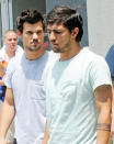 Taylor Lautner with his stunt double on the set of "Tracers" on June 24, 2013 in New York City.