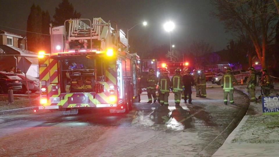 Fire crews at the scene of a house fire in Thornhill, Ont., that killed two people. Vaughan Mayor Steven Del Duca took to X, formerly Twitter, to offer his condolences Saturday night saying 'our hearts are heavy for the loss of two individuals.'  (Arlyn Mcadorey - image credit)