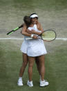 Czech Republic's Barbora Strycova and Taiwan's Su-Wei Hsieh celebrate defeating Canada's Gabriela Dabrowski and China's Yifan Xu in the women's doubles final match of the Wimbledon Tennis Championships in London, Sunday, July 14, 2019. (AP Photo/Ben Curtis)