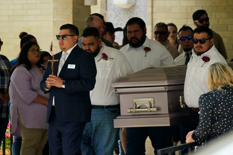 Pallbearers carry the casket of Amerie Jo Garza following funeral services at Sacred Heart Catholic Church, Tuesday, May 31, 2022, in Uvalde, Texas. Garza was killed in last week’s elementary school shooting.