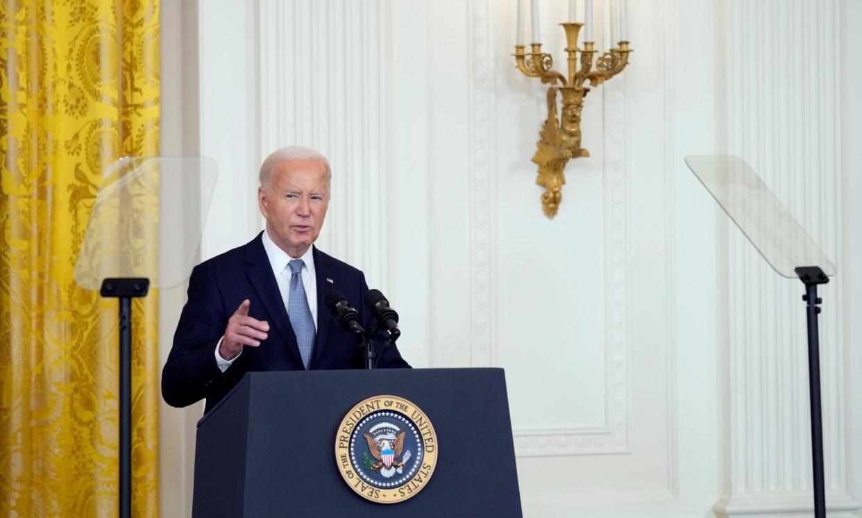 <span>Joe Biden told his campaign team: ‘I’m in this race to the end’, according to reports.</span><span>Photograph: Susan Walsh/AP</span>