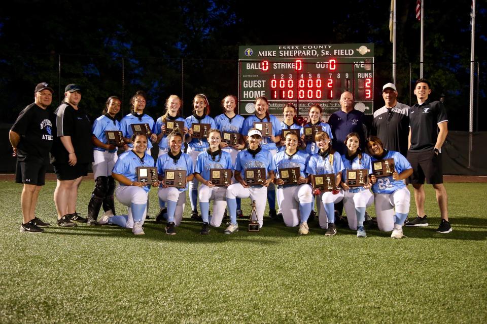 The Mount St. Dominic softball team celebrates a 3-2 victory over Nutley in the 2021 Essex County tournament final.