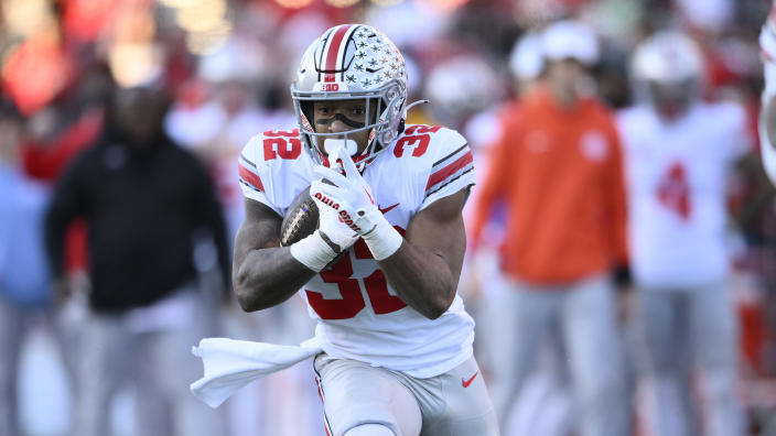 Ohio State running back TreVeyon Henderson (32) in action during the first half of an NCAA college football game against Maryland, Saturday, Nov. 19, 2022, in College Park, Md. (AP Photo/Nick Wass)