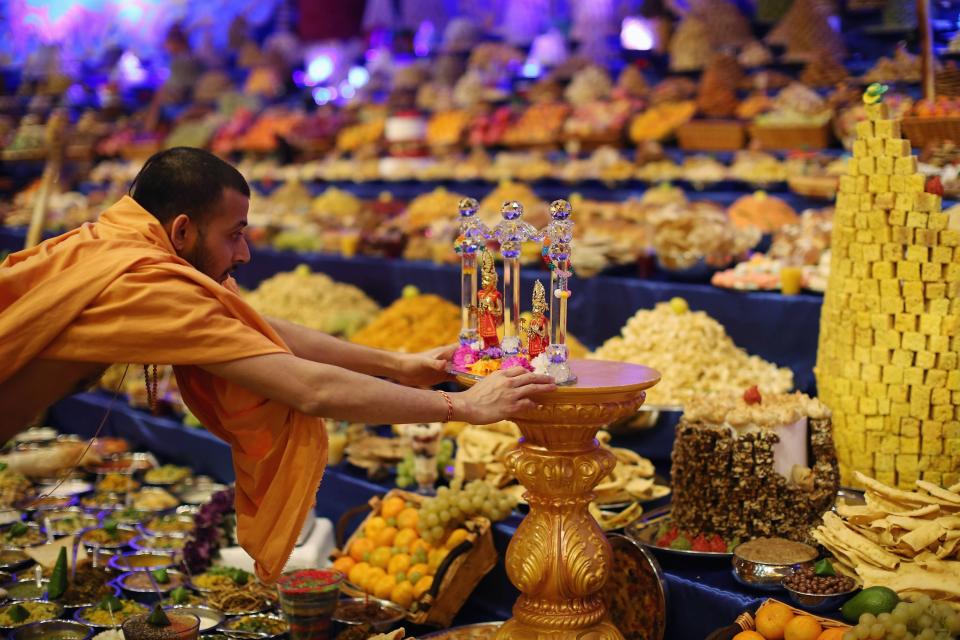 LONDON, ENGLAND - NOVEMBER 14: A religious motif is placed on a stand as Sadhus and Hindus celebrate Diwali at the BAPS Shri Swaminarayan Mandir on November 14, 2011 in London, England. Diwali, which marks the start of the Hindu New Year, is being celebrated by thousands of Hindu men women and children in the Neasden mandir, which was the first traditional Hindu temple to open in Europe. (Photo by Dan Kitwood/Getty Images)