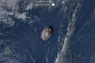 This satellite image taken by Himawari-8, a Japanese weather satellite operated by Japan Meteorological Agency and released by National Institute of Information and Communications Technology (NICT), shows an undersea volcano eruption at the Pacific nation of Tonga Saturday, Jan. 15, 2022. (NICT via AP)