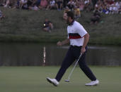 United States' Patrick Cantlay celebrates after holding his putt on the 18th green to win the afternoon Fourballs match by 1 at the Ryder Cup golf tournament at the Marco Simone Golf Club in Guidonia Montecelio, Italy, Saturday, Sept. 30, 2023. (AP Photo/Alessandra Tarantino)