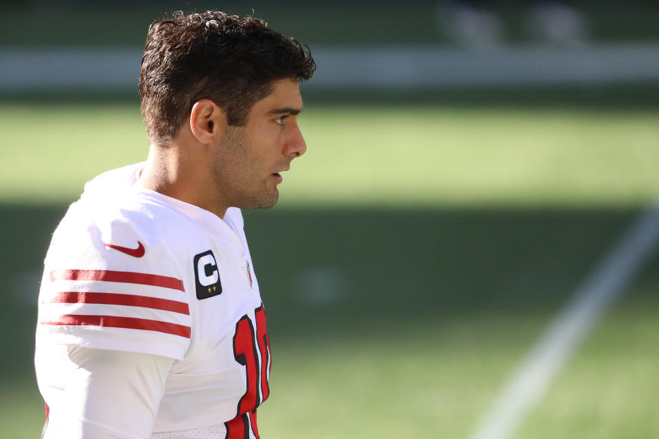 Jimmy Garoppolo looks on before a game.