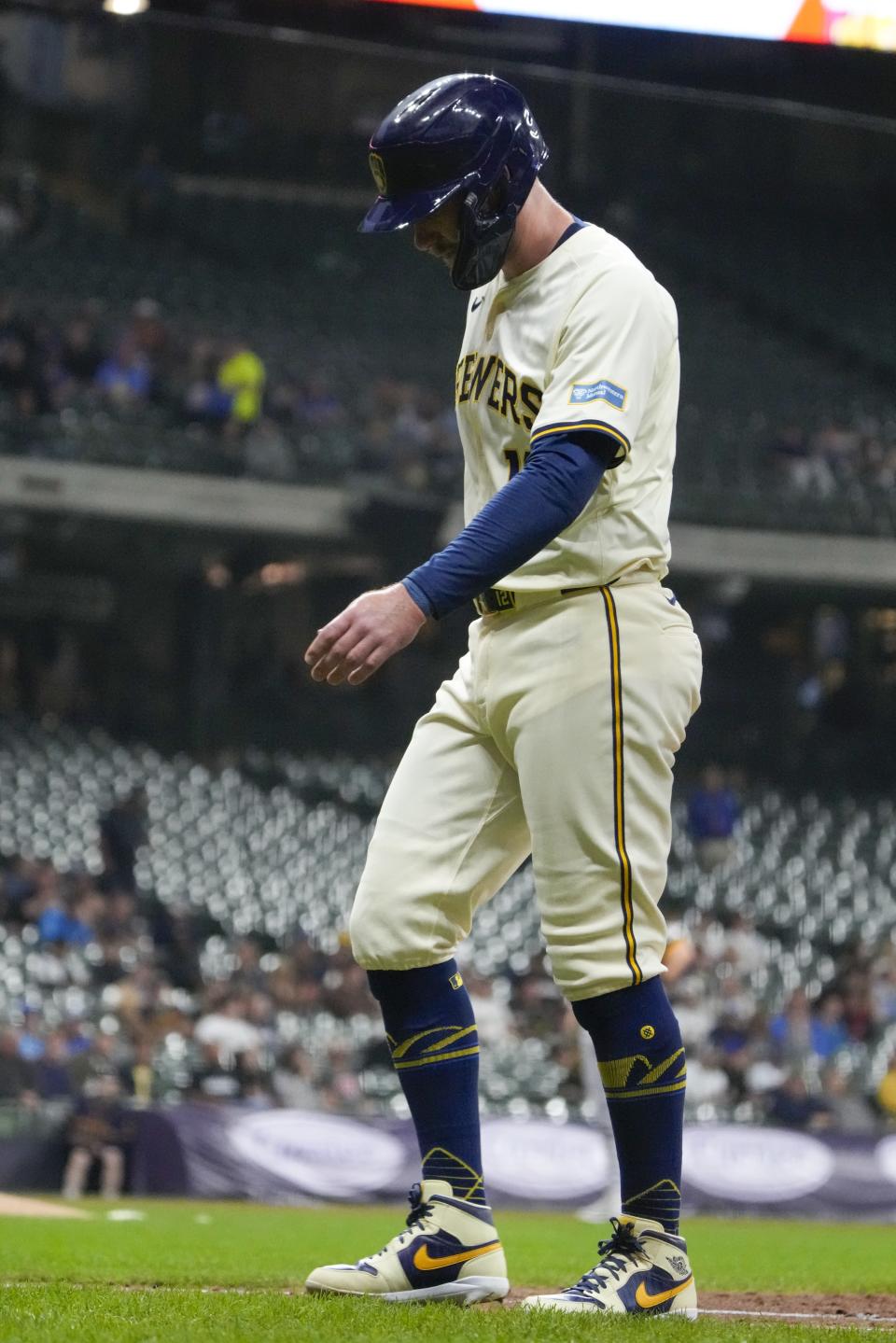 Milwaukee Brewers' Rhys Hoskins leaves the game after hitting a single during the second inning of a baseball game against the Pittsburgh Pirates Monday, May 13, 2024, in Milwaukee. (AP Photo/Morry Gash)