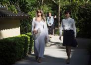 <p>The FLOTUS was seen wearing a long white dress and matching cardigan on a recent visit to the Morikami Museum and Japanese Gardens with Akie Abe, the wife of Prime Minister Shinzo Abe of Japan.</p>