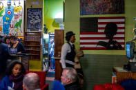 <p>Andy Shallal’s Busboys and Poets restaurant was a key gathering hub for progressives early in the Obama administration and the original 14th Street location, which opened in 2005, remains a multicultural hub. Embedded in it is a satellite branch of D.C.’s independent bookstore Politics & Prose. (Photo: Mary F. Calvert for Yahoo News) </p>