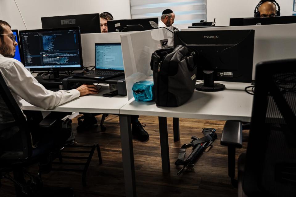 Adult students from Orthodox Jewish communities learn to code and program.