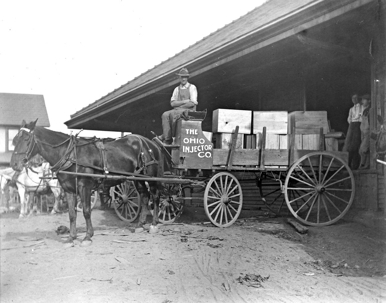 A deliveryman for the Ohio Injector Co. of Wadsworth sits on a horse-drawn wagon circa 1900. Does anyone recognize the location?