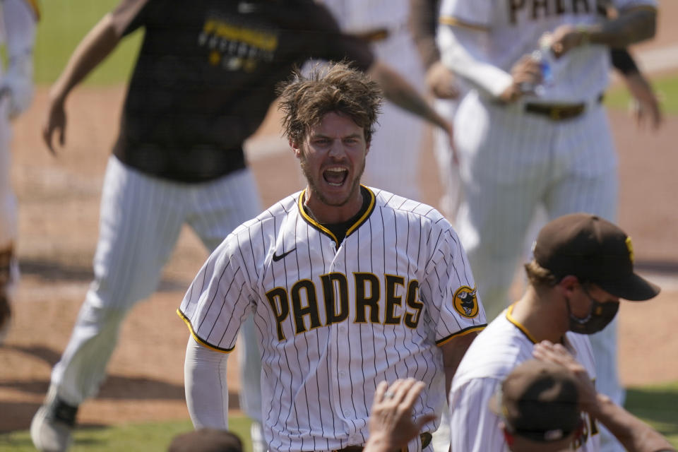 San Diego Padres' Wil Myers reacts after hitting a three-run walkoff home run to defeat the Seattle Mariners in a baseball game Thursday, Aug. 27, 2020, in San Diego. (AP Photo/Gregory Bull)