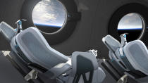 This undated photo released by Virgin Galactic shows the interior of their SpaceshipTwo Cabin during a flight. Highly detailed amenities to enhance the customer experience were shown in an online event Tuesday, July 28, 2020, revealing the cabin of the company's rocket plane, a type called SpaceShipTwo, which is undergoing testing in preparation for commercial service. There are a dozen windows for viewing, seats capable of being customized to each of six passengers and mood lighting. (Virgin Galactic via AP)