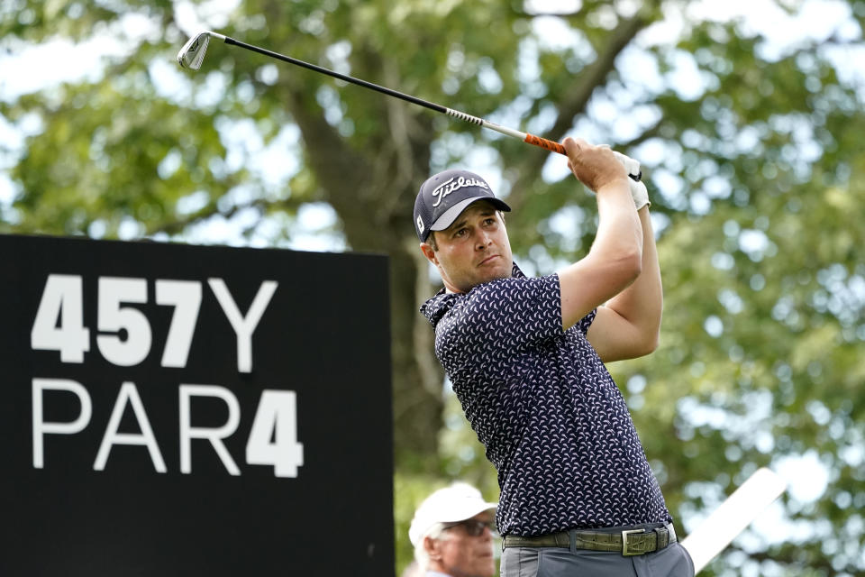 Peter Uihlein watches his tee shot on the fourth hold during the final round of the LIV Golf Invitational-Chicago tournament Sunday, Sept. 18, 2022, in Sugar Hill, Ill. (AP Photo/Charles Rex Arbogast)