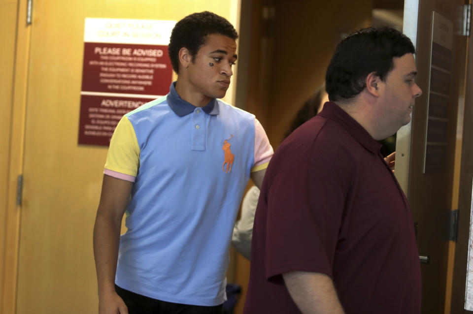 Zachary Cruz, the brother of school shooting suspect Nikolas Cruz, leaves a Broward Courtroom after a calendar call hearing at the Broward Courthouse in Fort Lauderdale, Fla., Wednesday, July 17, 2019. Nikolas Cruz is accused of killing of 17 and wounding others in Feb. 2018 at Marjory Stoneman Douglas High School in Parkland. (Carline Jean /South Florida Sun-Sentinel via AP, Pool)