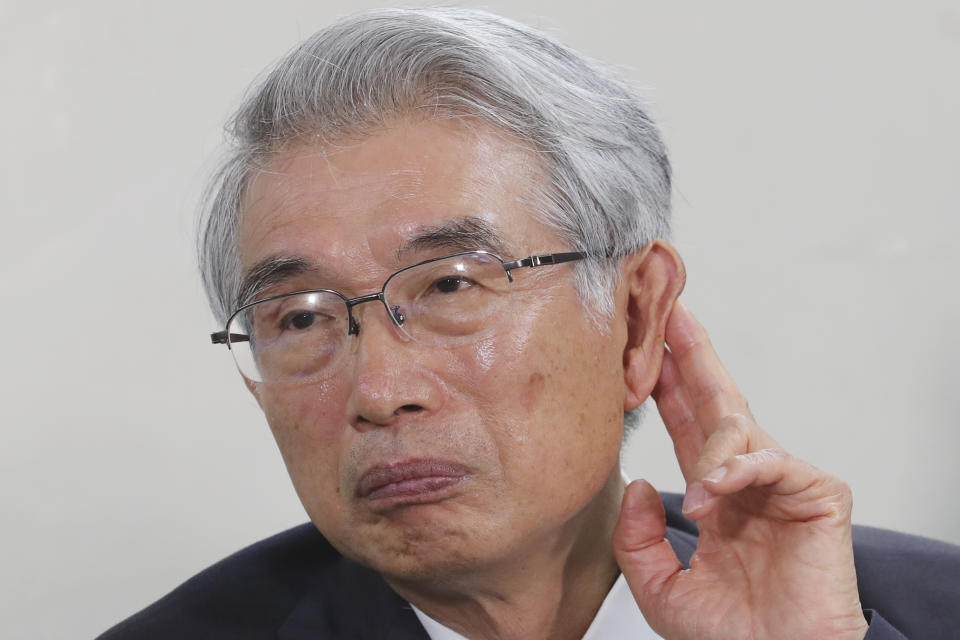 Junichiro Hironaka, a lawyer of former Nissan Chairman Carlos Ghosn, attends a press conference in Tokyo, Thursday, Oct. 24, 2019. The lawyers of former Nissan Chairman Carlos Ghosn, who is awaiting trial in Japan, said Thursday they have requested that financial misconduct charges against him be dismissed. (AP Photo/Koji Sasahara)