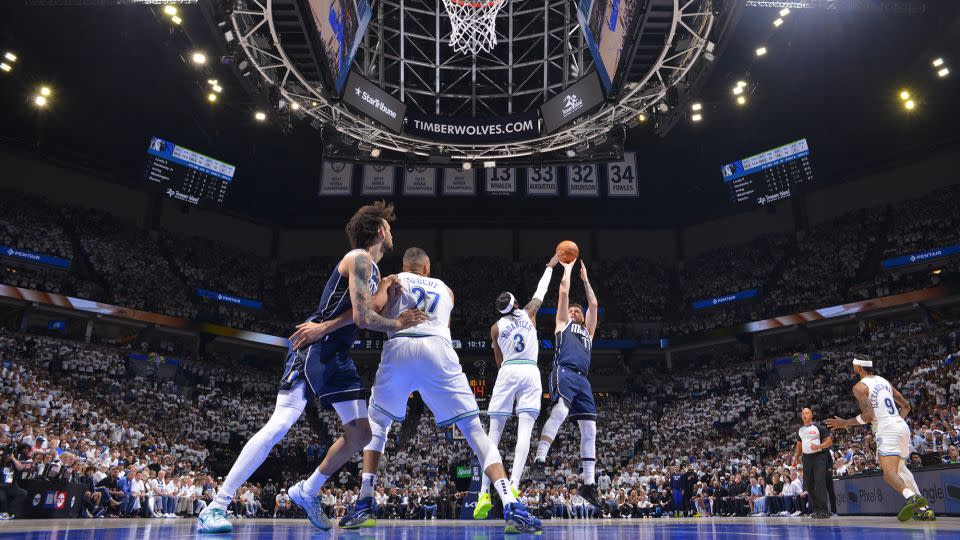 Dončić shoots against the Timberwolves in Game 1. - Jesse D. Garrabrant/NBAE/Getty Images