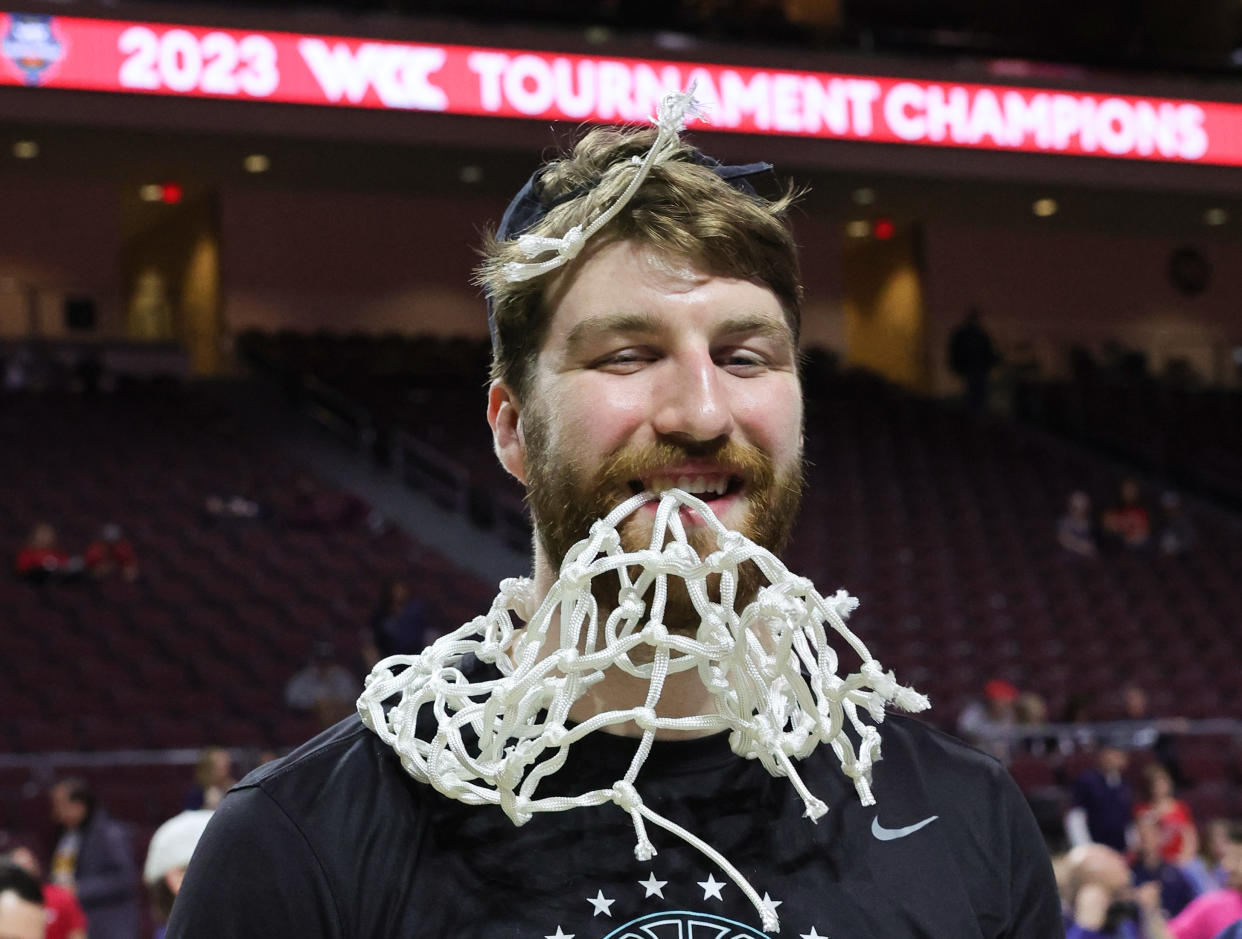 LAS VEGAS, NEVADA - MARCH 07: Drew Timme #2 of the Gonzaga Bulldogs poses after cutting down a net to celebrate the team's 77-51 victory over the Saint Mary's Gaels to win the championship game of the West Coast Conference basketball tournament at the Orleans Arena on March 07, 2023 in Las Vegas, Nevada. (Photo by Ethan Miller/Getty Images)