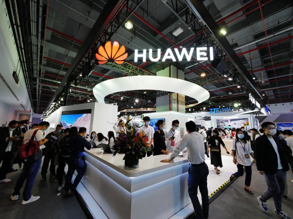 GUANGZHOU, CHINA - NOVEMBER 27: People visit the Huawei booth during 2020 World 5G Convention at Nan Fung International Convention & Exhibition Center on November 27, 2020 in Guangzhou, Guangdong Province of China. (Photo by Li Zhihao/VCG via Getty Images)