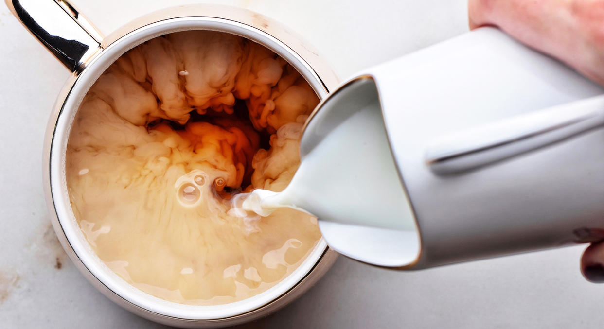 Adding milk to your tea or coffee lowers cancer risk. [Photo: Getty]