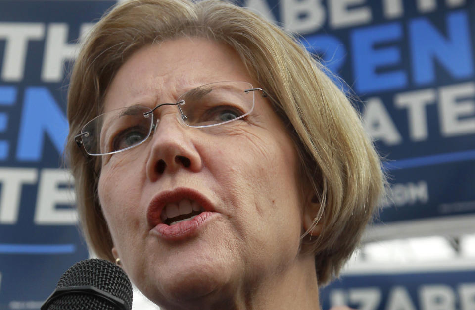 Democratic candidate for the U.S. Senate Elizabeth Warren addresses a crowd during a campaign stop in the Dorchester neighborhood of Boston Monday, Nov. 5, 2012. (AP Photo/Steven Senne)