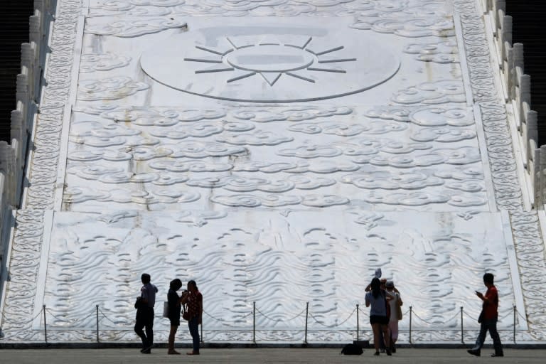 The monumental Kuomintang logo stands in front of the Chiang Kai-skek Memorial Hall in Taipei