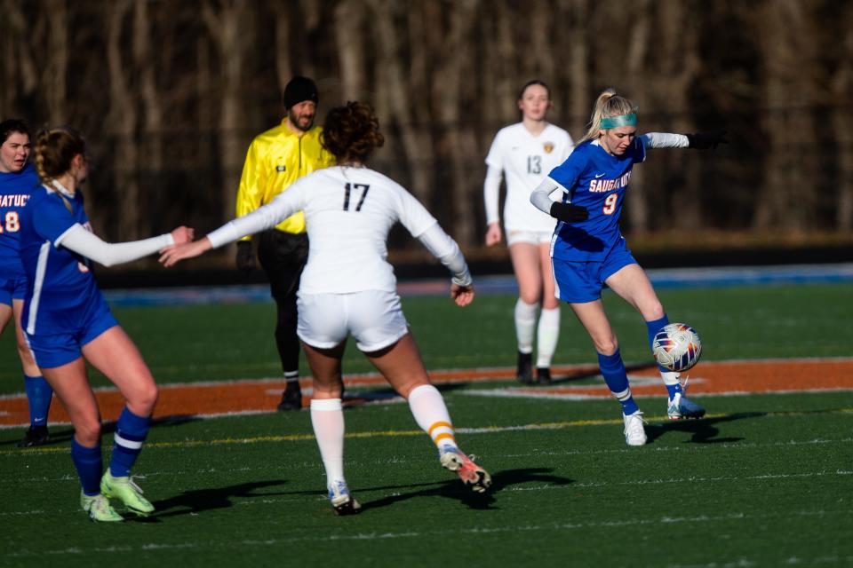 Saugatuck's Iris Kuipers takes control of the ball Monday, March 27, 2023, at Saugatuck High School. 