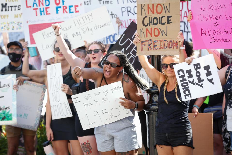 Abortion-rights protesters yell at a counter protester during a pro-choice protest on Monday, July 4, 2022. The counter protest was holding an Abolish Human Abortions sign. Community members of all ages rallied in protest of the Supreme Court of the United States' decision to overturn Roe v. Wade on Friday, June 24. Following the protest, the Party for Socialism and Liberation held a march to the federal courthouse.