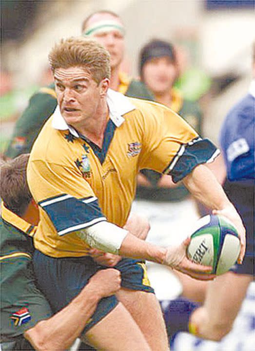 Tim Horan logró su segundo Mundial en Gales 1999, aunque no jugó la final que Australia le ganó a Francia.