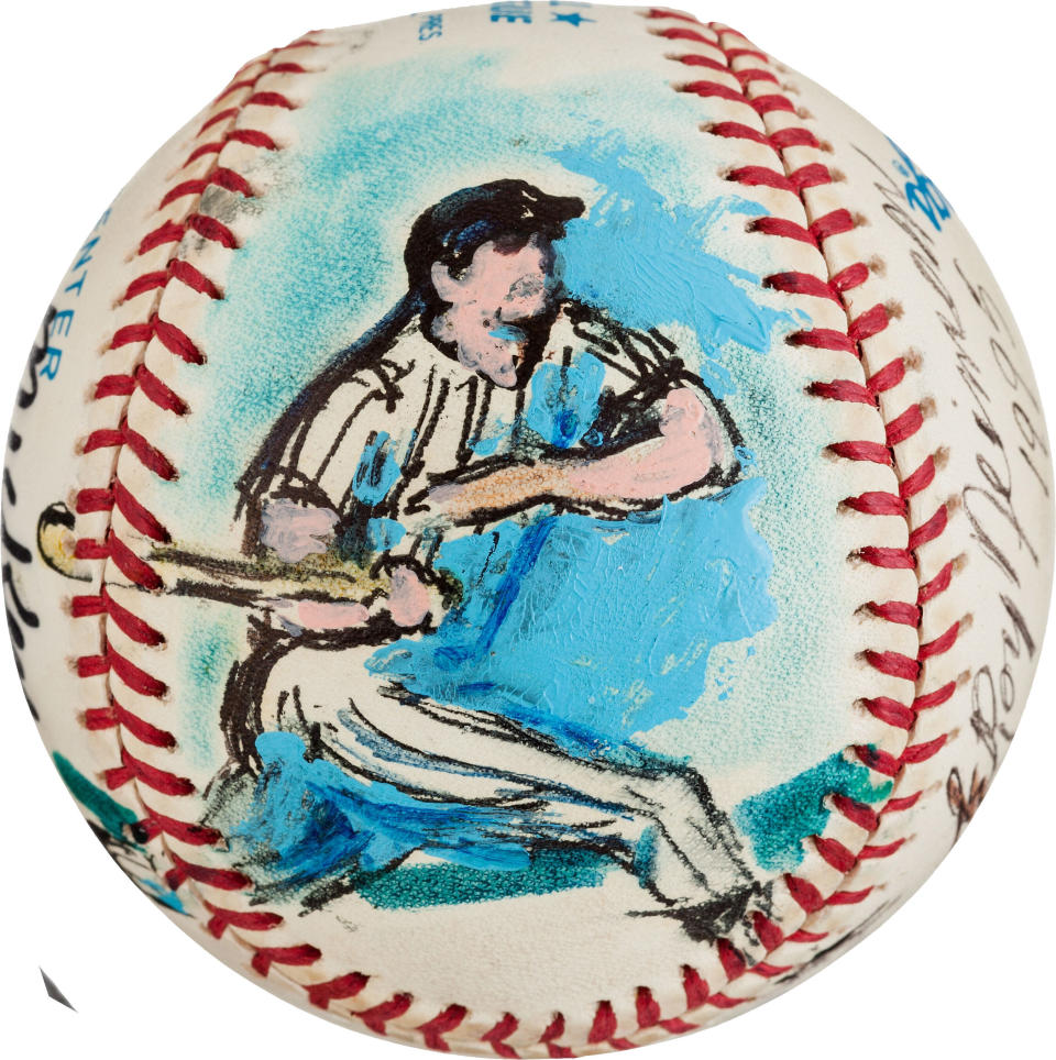 This undated photo provided by Heritage Auctions shows a baseball decorated by sports artist LeRoy Neiman in 1995 depicting Mickey Mantle swinging a bat and signed: “Mickey - There’ll never be another.” The ball is from the collection of bank marketing executive, which will be offered in a Heritage Auctions online sale on May 16. (AP Photo/Heritage Auctions)