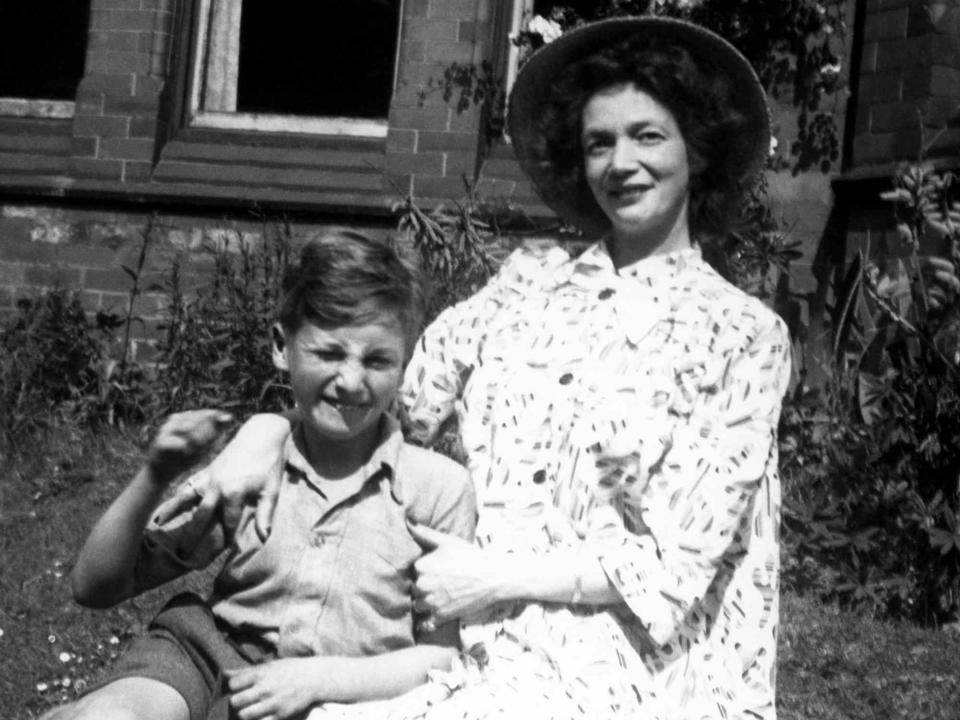 <p>Jeff Hochberg/Getty</p> Nine year old John Lennon with his mother Julia circa 1949 in Rock Ferry, Cheshire, England.