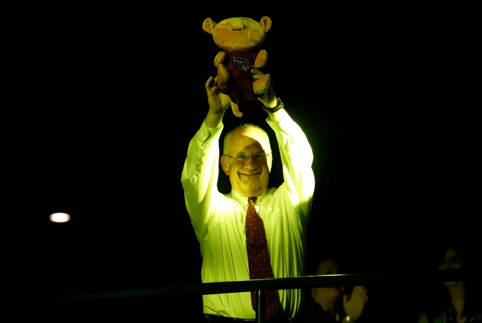 Missouri State President Clif Smart holds up a lion as he recreates the famous scene from The Lion King, after it was announced that the Broadway show, "The Lion King," would be coming to Juanita K. Hammons Hall for the Performing Arts in February of 2018.