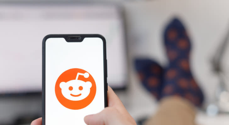 Reddit logo on smartphone screen