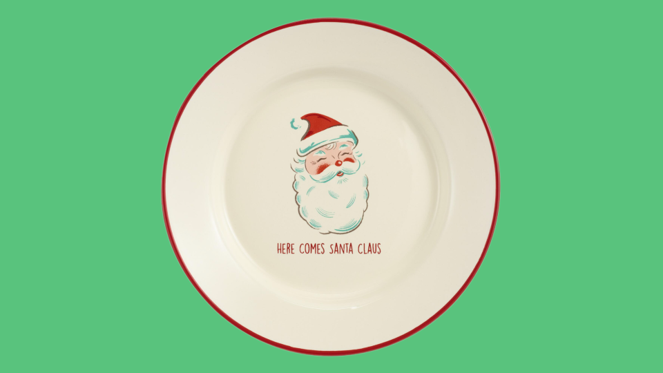 Who better than old Saint Nick to bring in the cheer at dinnertime?