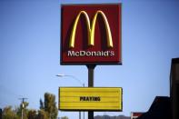 A McDonald's restaurant sign offers support to the families of the Umpqua Community College shooting victims in Roseburg, Oregon, United States, October 2, 2015. REUTERS/Lucy Nicholson