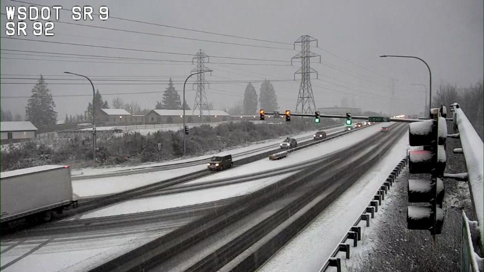 Washington State Department of Transportation cameras showed snow falling around Western Washington Wednesday.