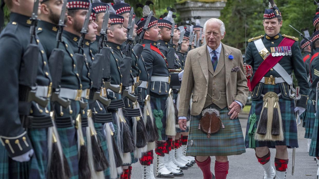 King Charles inspects guard of honour at Balmoral