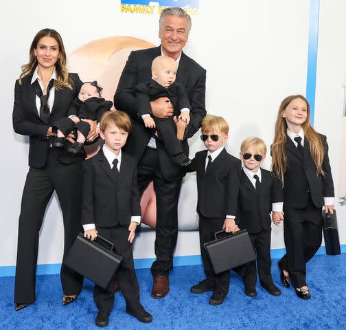 Monica Schipper/Getty Hilaria and Alec Baldwin with their children Lucia, Rafael, Eduardo, Leonardo, Romeo and Carmen at "The Boss Baby: Family Business" premiere in June 2021