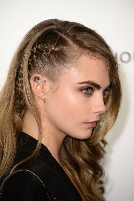 Model Cara Delevingne is known for her sassy diamond ear tat (among others).