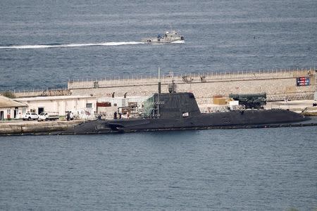 A British nuclear Astute-class submarine HMS Ambush is seen docked in a port while it is repaired after it was involved in a "glancing collision" with a merchant vessel off the coast of the peninsula of Gibraltar on Wednesday, in the British overseas territory of Gibraltar, July 21, 2016. REUTERS/Jon Nazca